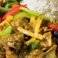 Curry Goat · Served with your choice of Rasta pasta, rice & peas, mixed vegetables, mashed potatoes, or w...