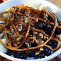 Banana Nut Oatmeal · Topped with banana, blueberries, walnuts and peanut butter.