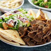 Chicken And Lamb Gyro Platter  · Juicy thin sliced chicken and lamb with mix salad and chef's sauce.