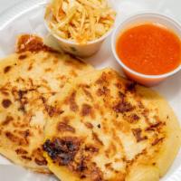 Pupusas Loca · 10 inch pupusa stuffed with pork, loroco, beans, and cheese. Served with cabbage salad & tom...