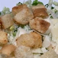 Caesar Salad · Romaine lettuce, or kale, shaved Parmesan cheese, croutons and Caesar dressing.