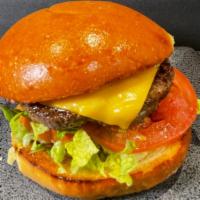 Cheese Burger · All natural Angus beef topped with American cheese, lettuce and tomato on brioche roll.