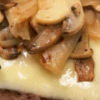 Antwan'S Swiss Burger · All natural Angus beef topped with Swiss cheese, caramelized onions, sautéed mushrooms, lett...