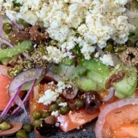 Village Greek Salad · Tomatoes, cucumber, onions, olives, green peppers, feta cheese, capers,oregano and olive oil.