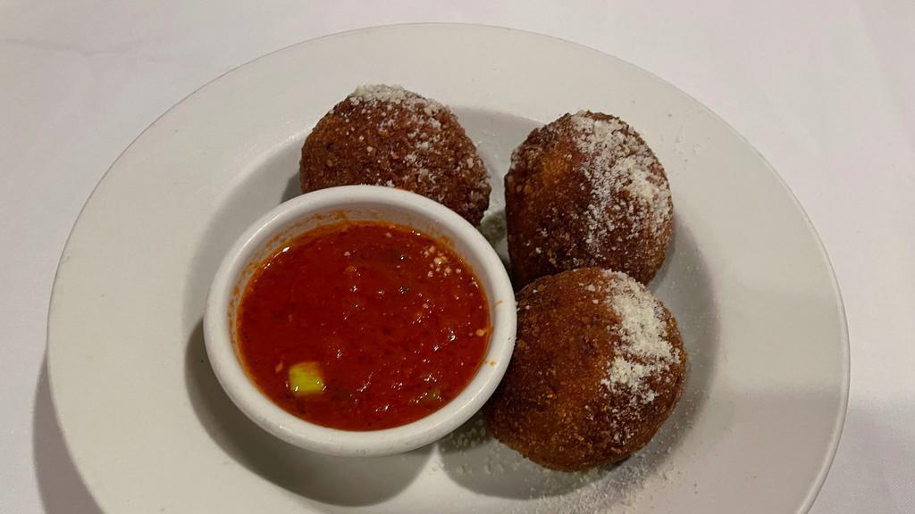 Rice Balls · Filled with Mozzarella, Sun-Dried Tomato and Basil with a Marinara Dipping Sauce