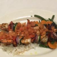 Shrimp Spiedini · Grilled Shrimp, Zucchini, Onions, Peppers, Tomato Vinaigrette over Jasmine Rice