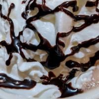 Hot Ghirardelli Chocolate · Ghirardellis chocolate with steamed whole milk and topped with whipped cream, chocolate sauc...