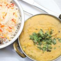 Yellow Tadka Daal · Lentils cooked with mustard seed and curry leave.