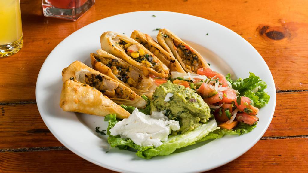 Chicken Spring Rolls · Southwestern style, served with guacamole and sour cream.