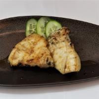 Chilean Sea Bass Kama · Chilean sea bass collar, the most fatty and juicy part of the fish, lightly seasoned with sa...