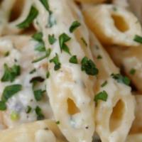 Pasta With White Truffle Sauce · Heavy cream reduction, white truffle oil, 5 months aged Parmesan cheese, parsley. Served wit...