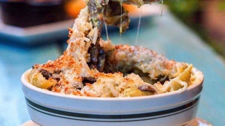 Truffle Mac · Shell pasta mixed w/ chef's special cheese blend, Cremini mushrooms, white truffle oil and topped with parsley. Not your regular mac and cheese. Find out why we won the mac and cheese contest. Shell pasta mixed with chefs special blend.