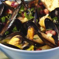Mussels With Bacon · Wild organic PEI mussels, white wine sauce, smoked bacon lardons, garlic, onions, parsley an...