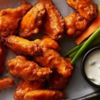 Classic Jumbo Chicken Wings · 6 pieces tossed in your choice of sauce, gluten free. Choice of honey chipotle, buffalo sauc...