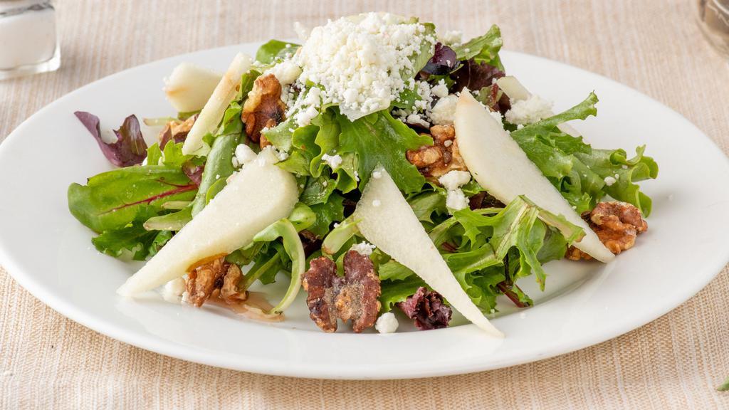 Pear Salad · Mixed greens with pears, walnuts and goat cheese in a pear champagne dressing. Gluten free.