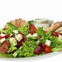 Crispy Chicken Salad · Crispy chicken, croutons, tomatoes, shredded cheese, olives and your choice of dressing.