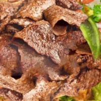 (4)Beef Shawarma Platter · Served with rice, salad and pickle.