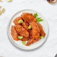 Hot Ville Wings · Fresh chicken wings breaded, fried until golden brown, and tossed in Nashville Hot Sauce. Se...
