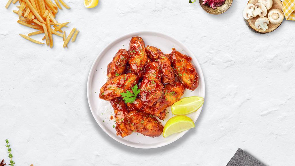 Honey Cookout Bbq Wings · Fresh chicken wings breaded, fried until golden brown, and tossed in honey and barbecue sauce. Served with a side of ranch or bleu cheese.