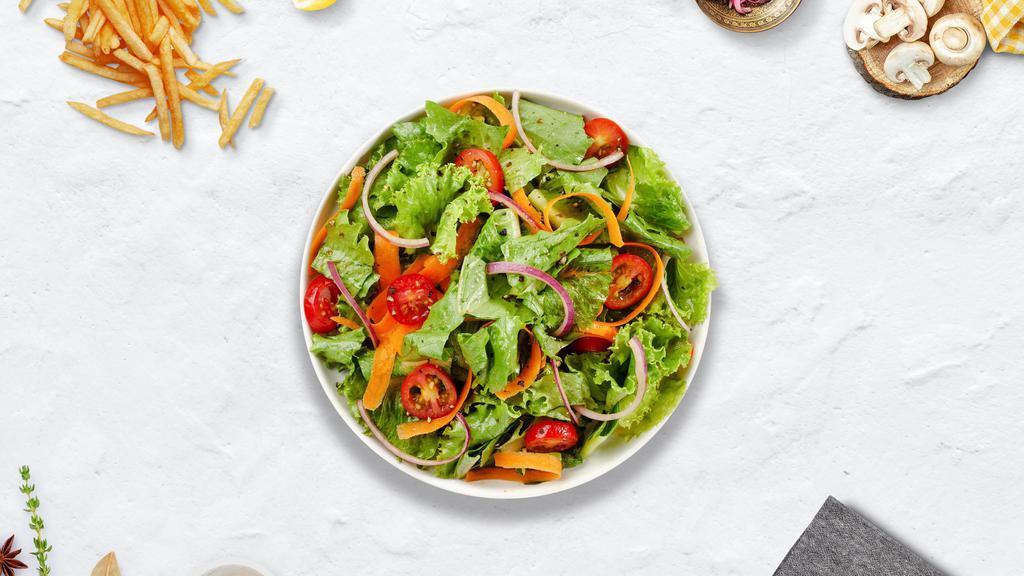 Mixed Greens Salad · (Vegetarian) Romaine lettuce, cherry tomatoes, carrots, and onions dressed tossed with lemon juice & olive oil