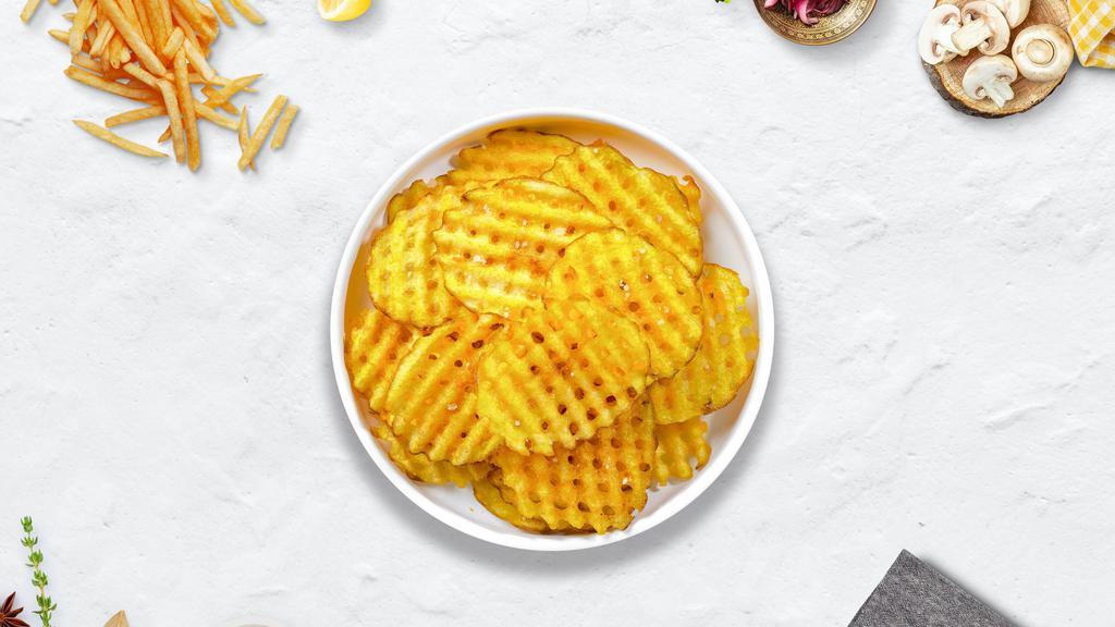 Waffle Fries · (Vegetarian) Idaho potatos sliced in an alternating waffle pattern, fried until golden brown, and garnished with salt.
