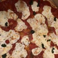 Margherita · Fresh San Marzano tomato, fresh mozzarella, topped with pecorino Romano, extra virgin olive ...