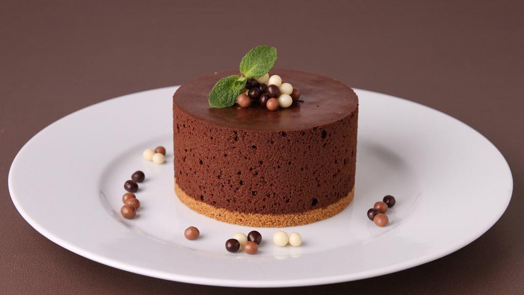 Chocolate Mousse Cake · Rich and moist mousse cake.