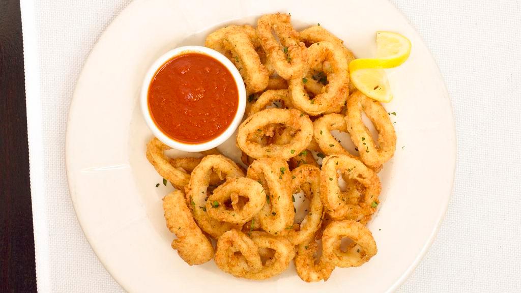 Fried Calamari · With lemon wedges and marinara
