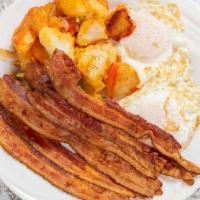 2 Eggs Platter With Meat · Served with home fries and choice of toast.
(meat choice bacon, sausage, ham, or turkey )