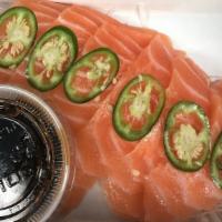 Salmon Carpaccio · 3 pcs slice salmon with yuzu sauce..