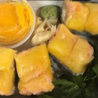 Golden Buddha · eel,avocado,lobster salad, slice mango