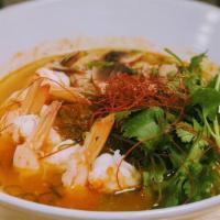Shrimp Tom Yum Rice Noodle Soup · Spicy lemongrass broth, shrimp, straw mushrooms, cilantro, takana, chili pepper, spicy bean ...
