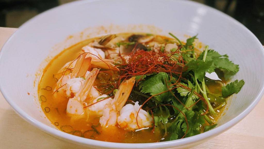Shrimp Tom Yum Rice Noodle Soup · Spicy lemongrass broth, shrimp, straw mushrooms, cilantro, takana, chili pepper, spicy bean sprouts.