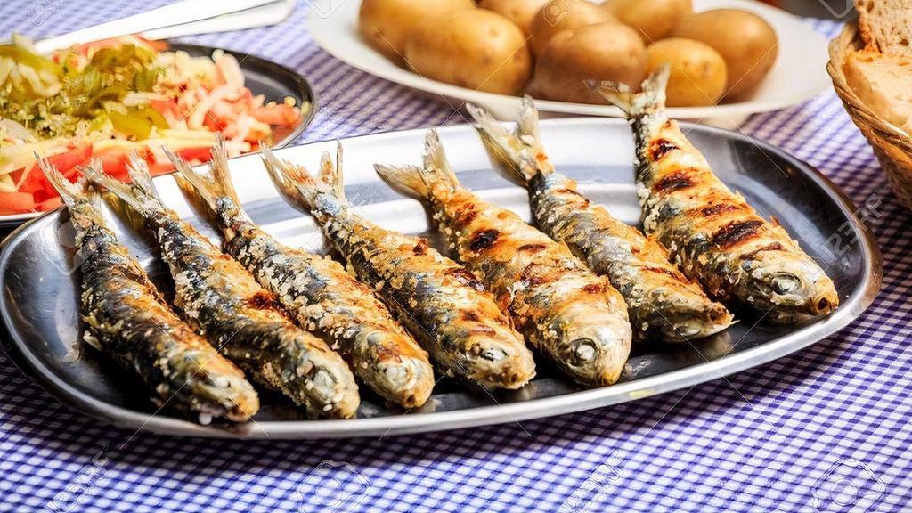 Grilled Sardines · 6 sardines served with boiled potato and tomato salad