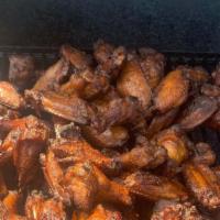 Smoked Wings · Smoked chicken wings with a dry rub.