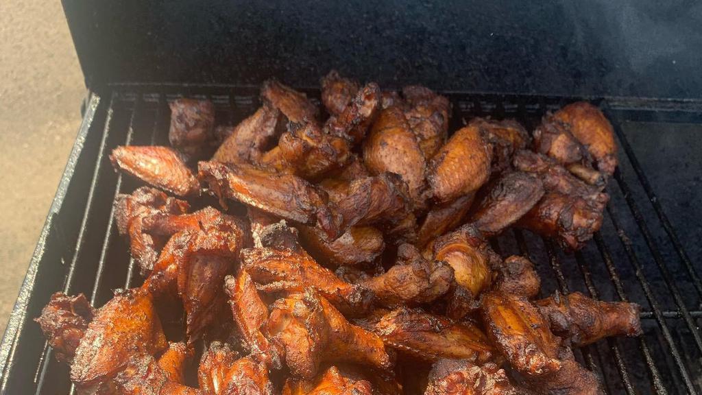 Smoked Wings · Smoked chicken wings with a dry rub.
