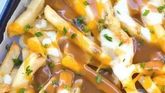 Disco Fries · French fries topped with mozzarella cheese and gravy.