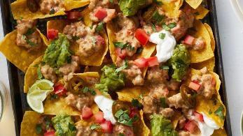 Nacho Platter · Fresh tortilla chips, with chili, beans, jalapenos, tomatoes, cheddar and mozzarella cheeses...