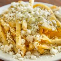 Greek Fries · Topped with feta cheese and oregano.