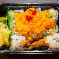 Hurricane Roll · Shrimp tempura, avocado, cucumber with spicy shrimp and spicy tuna on top.