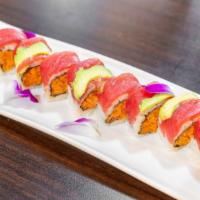 Spicy Titanic Roll · Spicy tuna Crunchy with tuna and avocado on top.