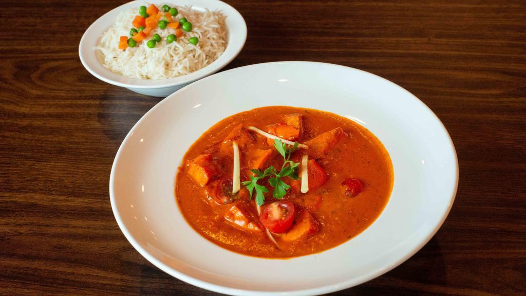 Chicken Tikka Masala · Chicken cubes cooked with onion and peppers in tomato sauce.