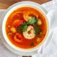 Tom Yum Soup · Spicy. Choice of chicken or tofu in tom yum flavored soup with lemongrass, galangal root, ka...