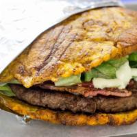 Burger Patacon · Smashed plantain sandwich stuffed with a beef patty, yellow american cheese, double smoked b...