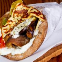 Bbq & Veggie Pita Sandwich · Flavorful Grilled Veggies Mixed with BBQ Sauce, Tzatziki sauce, Diced Tomatoes in a homemade...