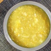 Egg Drop Soup · Served with crispy noodles, homemade style.