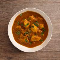 Chicken Madras · Chicken cooked with cumin, coriander, turmeric, with a hearty tomato based sauce.