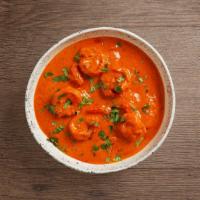Shrimp Masala · Shrimp cooked with yogurt and spices.