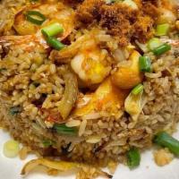 Thai Pineapple Fried Rice / Khao Pad Sapparod · Iconic Thai fried rice with your choice of protein, pineapple, cashews, egg, garlic, onions,...