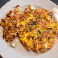 Green Star Omelette · Feta cheese, scallions, tomato, grilled chicken breast, and spinach. Served with home fries ...